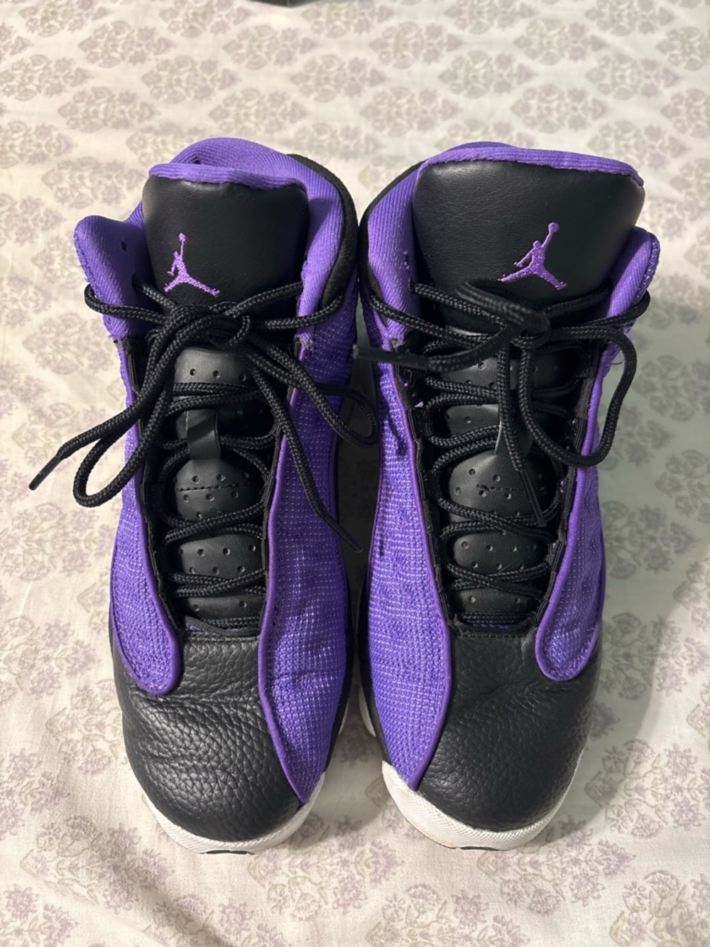 Jordan 13s in Black and Purple